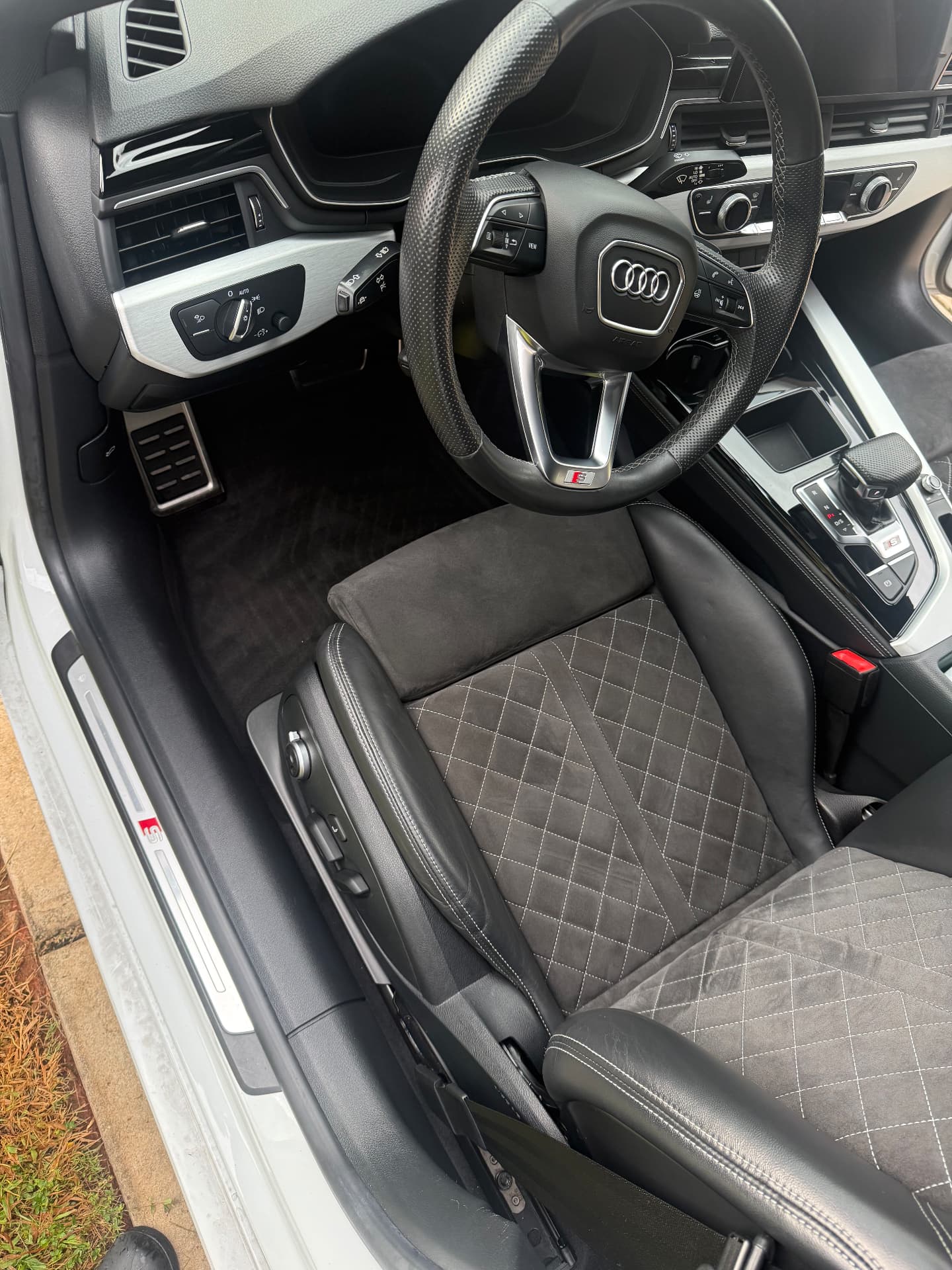 Detailed Audi S4 driver seat, dash and steering wheel after Miller's Detailing interior detail in Atlanta